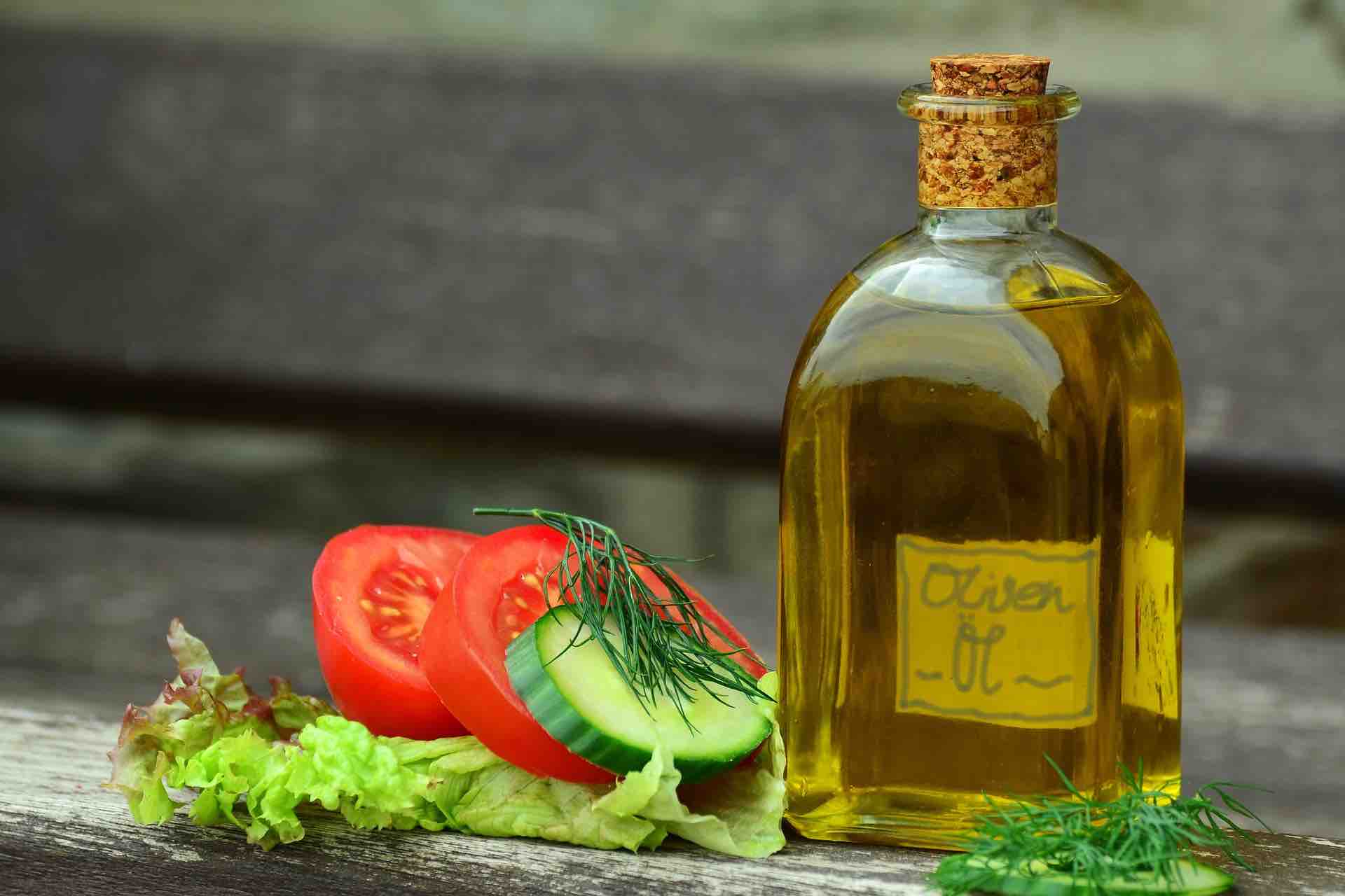 Picture of olive oil and healthy vegetables